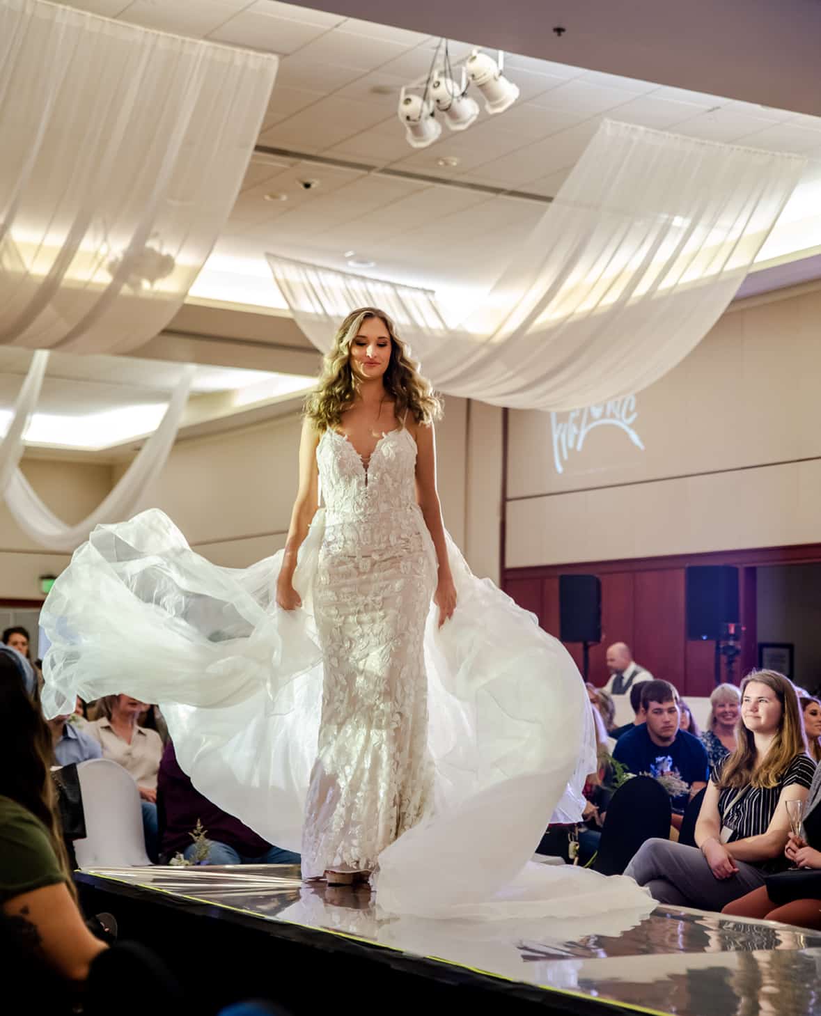Fashion show of bridal gown at WV's Premier Wedding Expo